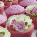 pink girls 1st birthday cupcake close up