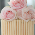 new avalanche rose cigerello white chocolate wedding cake close up 1